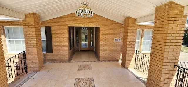 property entrance featuring a porch