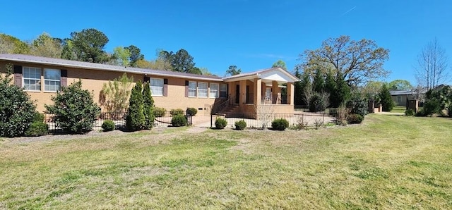 view of front of property with a front lawn