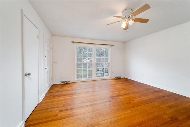 interior space featuring ceiling fan and light hardwood / wood-style flooring