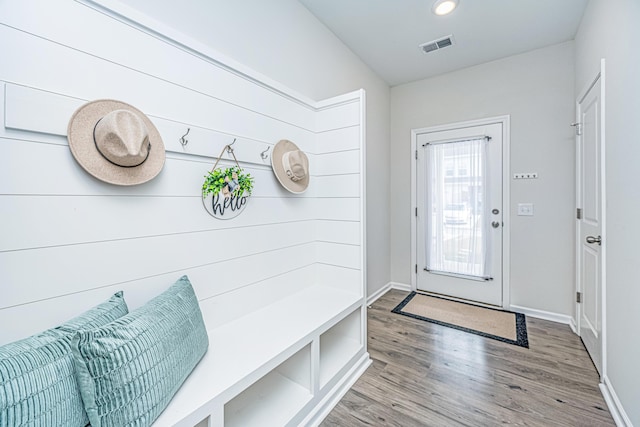 mudroom with light hardwood / wood-style flooring