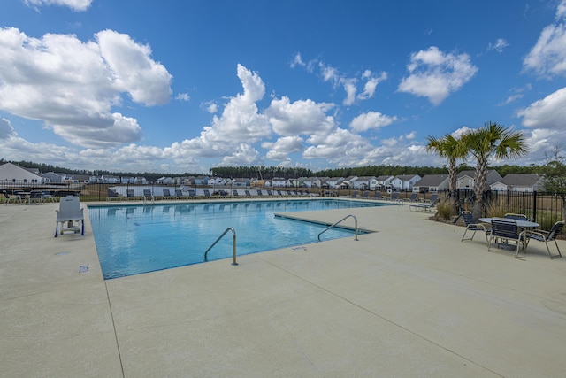 view of pool with a patio