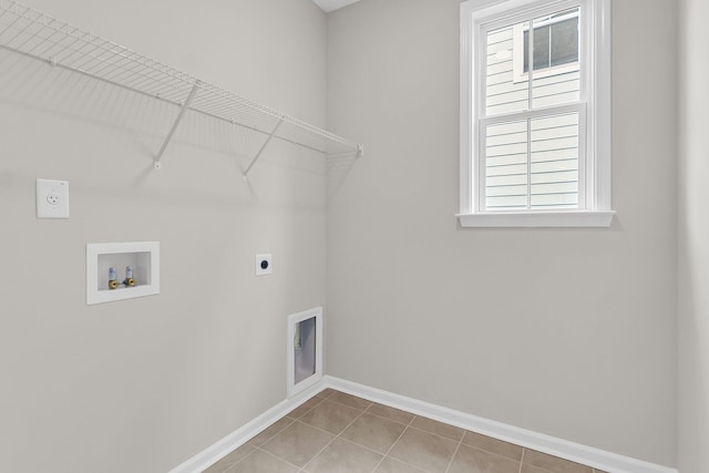 327 Hillman Trl Dr, Moncks Corner, SC 29461 - laundry room featuring hookup for an electric dryer, hookup for a washing machine, baseboards, and tile patterned floors