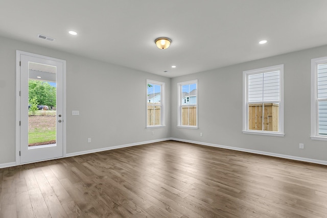 327 Hillman Trl Dr, Moncks Corner, SC 29461 - unfurnished room with dark wood finished floors, healthy amount of natural light, baseboards, and recessed lighting