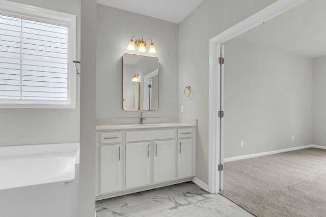 327 Hillman Trl Dr, Moncks Corner, SC 29461 - full bath featuring vanity, marble look tiles, a garden tub, and baseboards