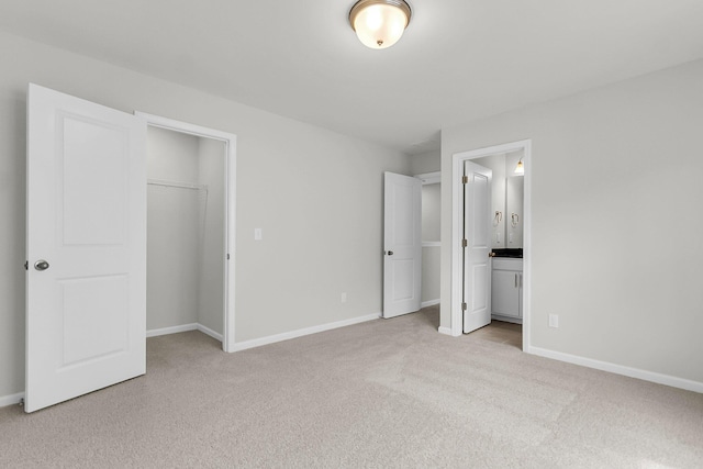 327 Hillman Trl Dr, Moncks Corner, SC 29461 - unfurnished bedroom featuring light carpet, baseboards, and connected bathroom