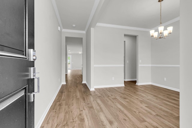 327 Hillman Trl Dr, Moncks Corner, SC 29461 - empty room featuring light wood-type flooring, crown molding, a chandelier, and baseboards