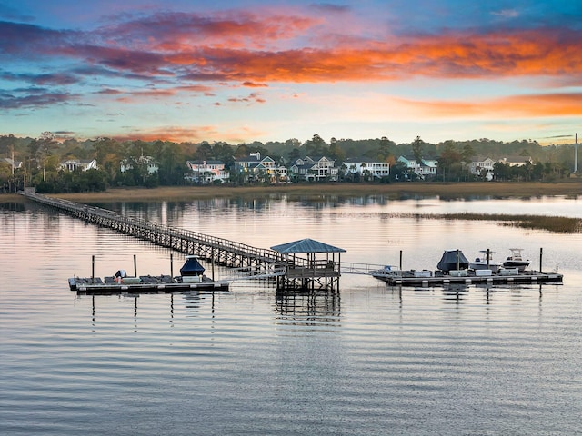 dock area featuring a water view