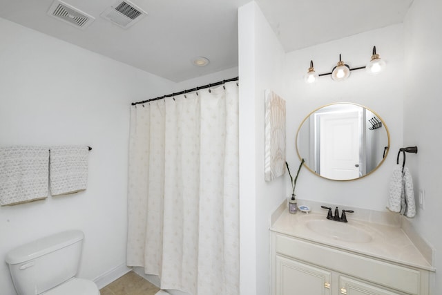full bathroom with tile patterned floors, visible vents, vanity, and toilet