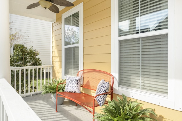balcony with ceiling fan and covered porch