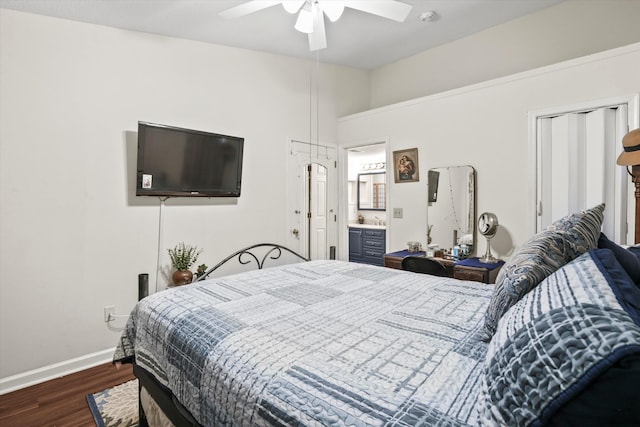 bedroom with dark wood-style flooring, baseboards, ceiling fan, and lofted ceiling