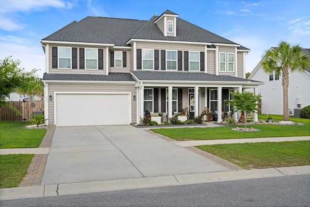 451 Spectrum Rd, Summerville, SC 29486 - view of front of property with covered porch, a garage, driveway, a shingled roof, and central air condition unit