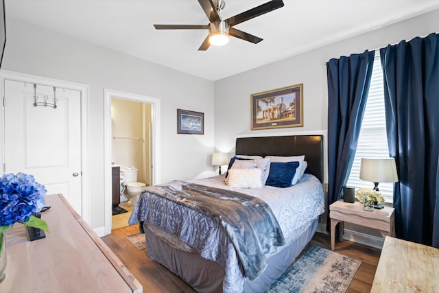 451 Spectrum Rd, Summerville, SC 29486 - bedroom with wood finished floors, a ceiling fan, and ensuite bath
