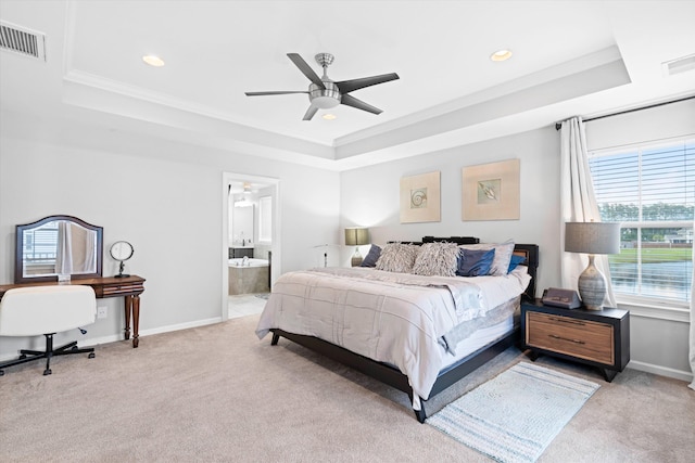 451 Spectrum Rd, Summerville, SC 29486 - bedroom featuring a tray ceiling, light carpet, recessed lighting, ornamental molding, and baseboards