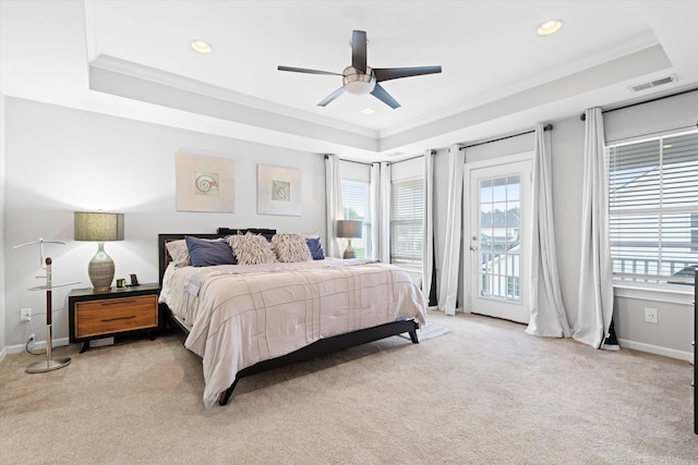 451 Spectrum Rd, Summerville, SC 29486 - bedroom featuring a raised ceiling, crown molding, multiple windows, light colored carpet, and recessed lighting