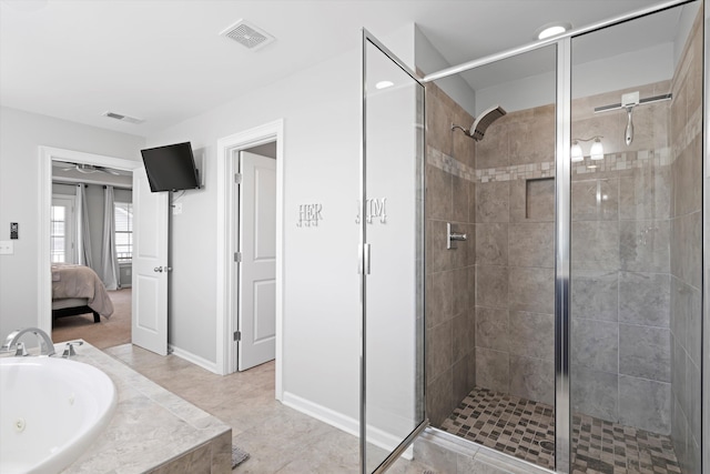 451 Spectrum Rd, Summerville, SC 29486 - ensuite bathroom featuring a shower stall, a whirlpool tub, a sink, and baseboards