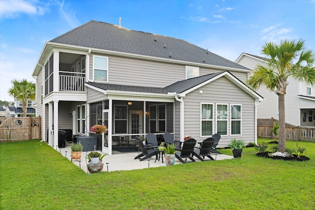 451 Spectrum Rd, Summerville, SC 29486 - rear view of house with a sunroom, a patio area, roof with shingles, and a gate