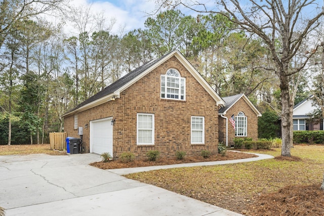 traditional-style home with brick siding and driveway