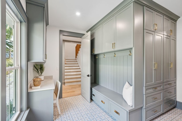 mudroom featuring a wealth of natural light and light hardwood / wood-style flooring