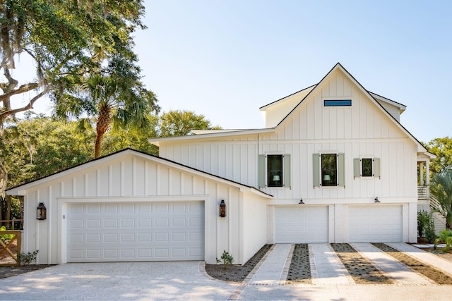 modern inspired farmhouse featuring a garage