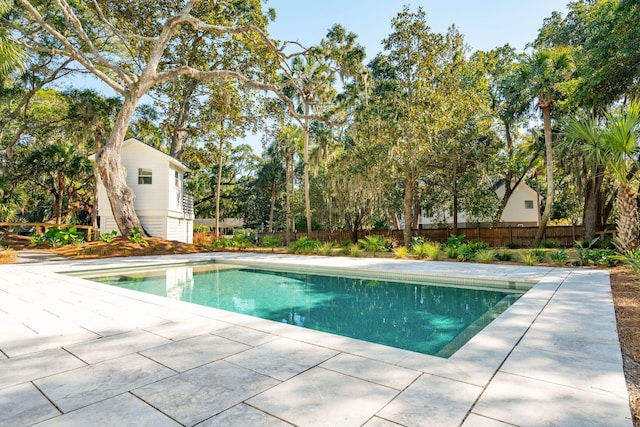 view of pool featuring a patio area