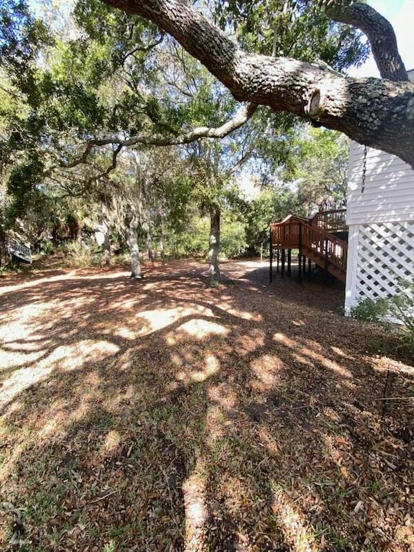 view of yard featuring a deck