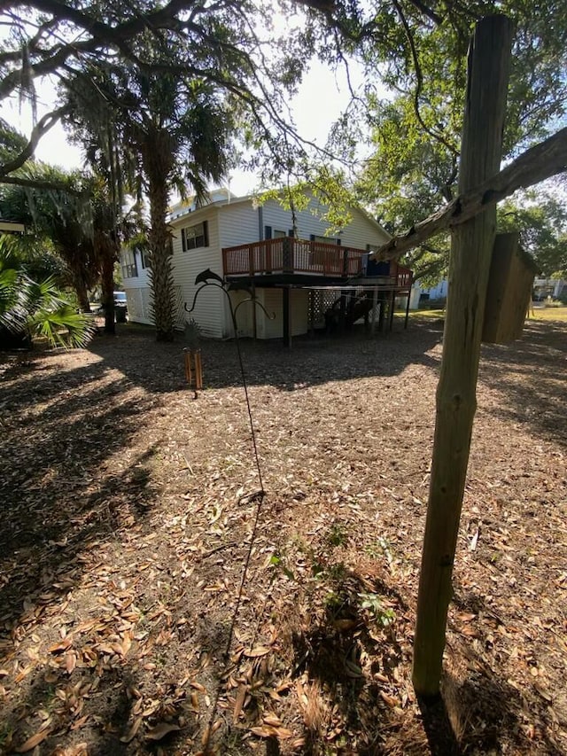 view of yard with a wooden deck