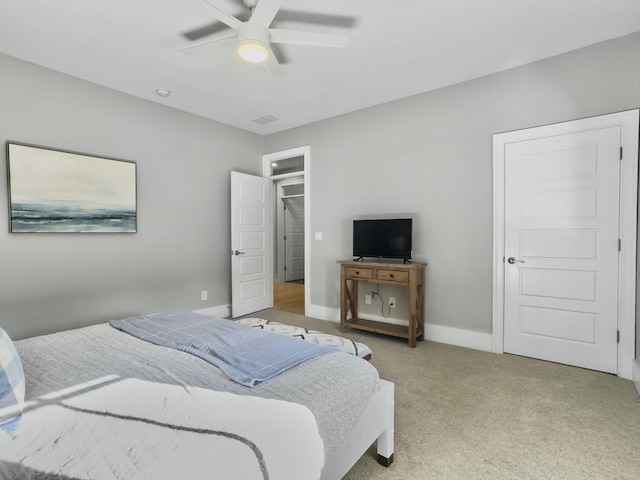 bedroom featuring ceiling fan and carpet floors