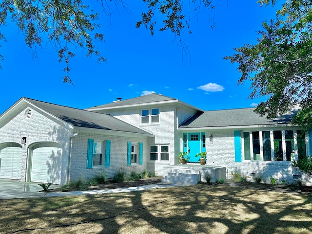 view of front of home featuring a garage