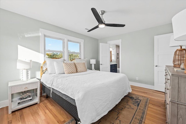 1894 Capri Dr, Charleston, SC 29407 - bedroom featuring light wood-style flooring, a ceiling fan, and ensuite bath