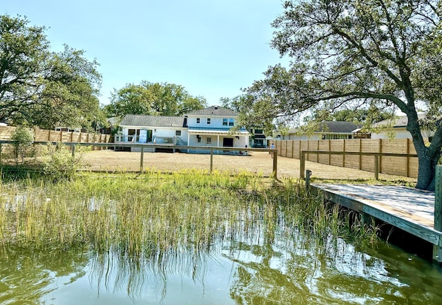1894 Capri Dr, Charleston, SC 29407 - back of property with a fenced backyard and a water view