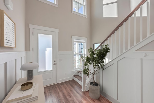 foyer featuring a high ceiling and hardwood / wood-style flooring