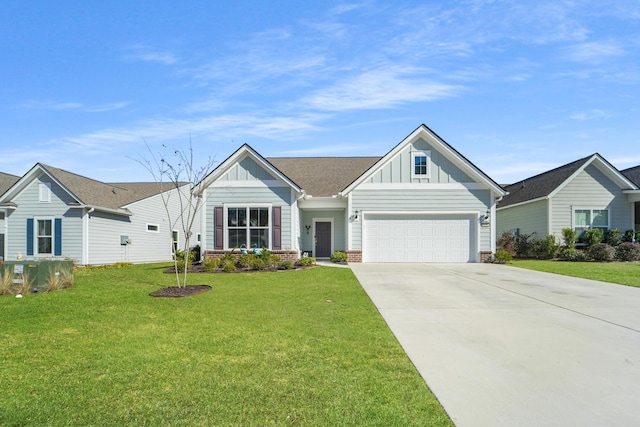 view of front of home with a garage and a front lawn