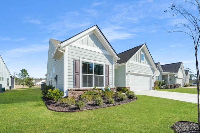 view of front of home featuring a garage and a front yard