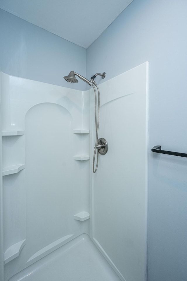 bathroom with a shower