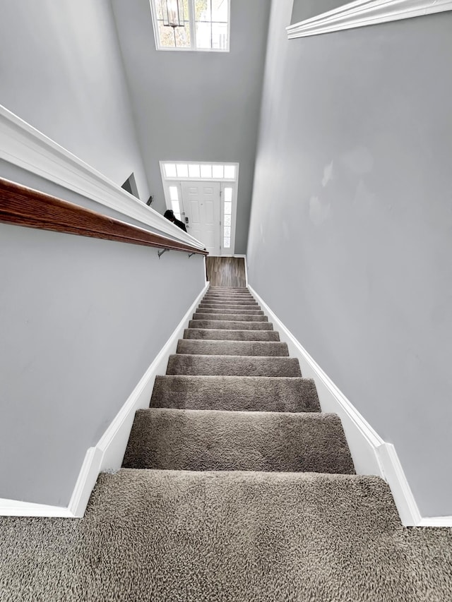 stairs featuring a wealth of natural light