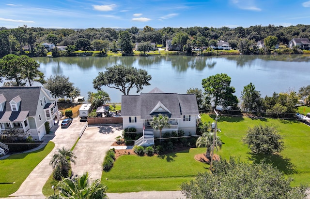 drone / aerial view with a water view