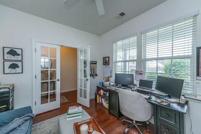 office area with a wealth of natural light, french doors, wood finished floors, and visible vents