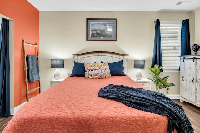 bedroom featuring hardwood / wood-style floors