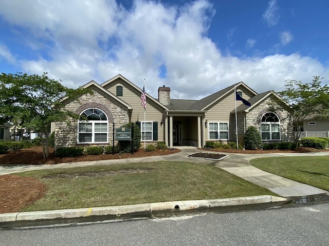 view of front of house with a front lawn