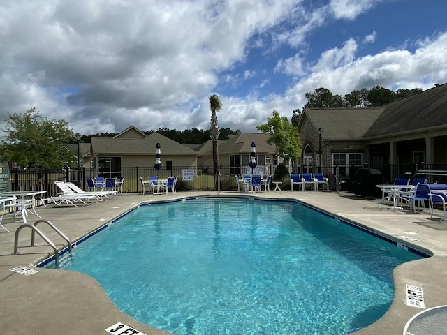 view of pool with a patio area