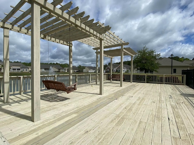 wooden deck with a pergola