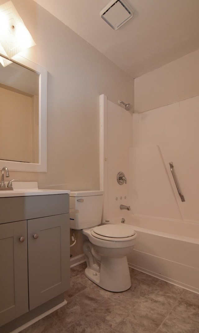 full bathroom with vanity, bathtub / shower combination, toilet, and tile patterned floors