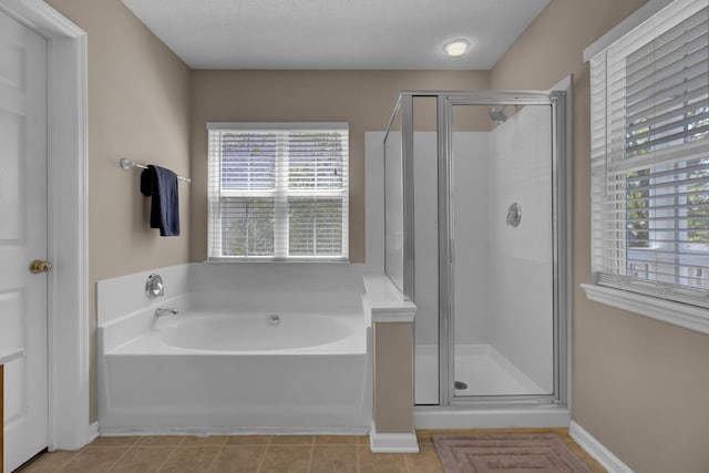 30 Regency Oaks Dr, Summerville, SC 29485 - bathroom with a bath, a shower stall, tile patterned floors, and baseboards