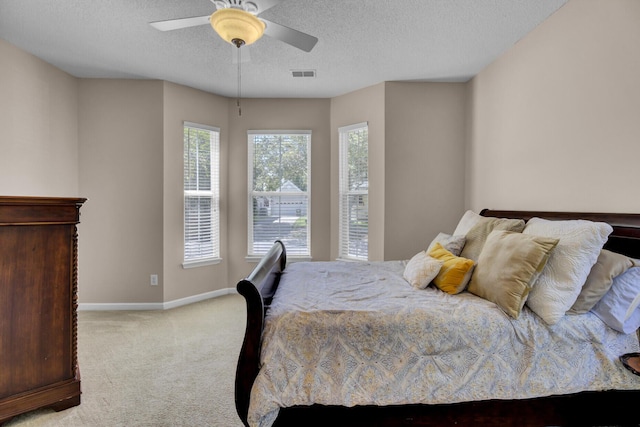 30 Regency Oaks Dr, Summerville, SC 29485 - bedroom with light colored carpet, baseboards, a textured ceiling, and a ceiling fan