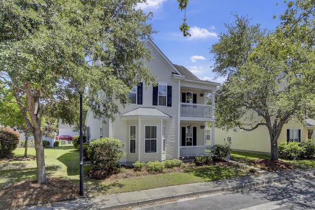 30 Regency Oaks Dr, Summerville, SC 29485 - greek revival inspired property featuring covered porch, a front yard, and a balcony