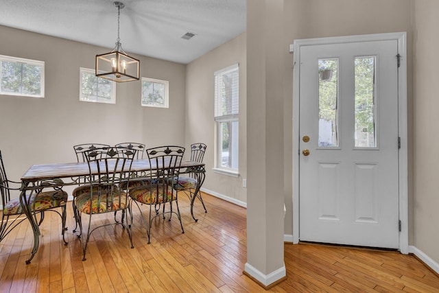 30 Regency Oaks Dr, Summerville, SC 29485 - dining space with baseboards, light wood finished floors, and a chandelier