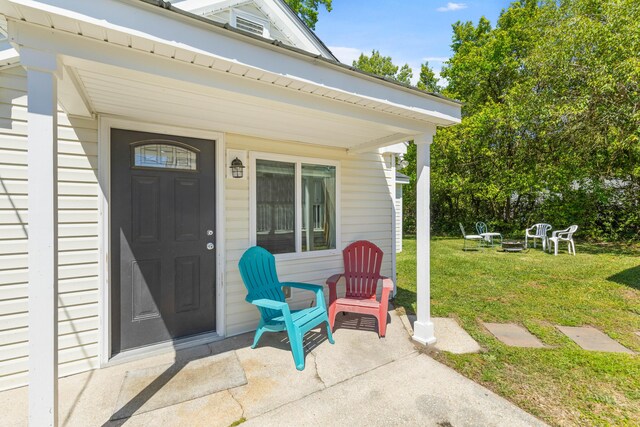 1324 Maxwell St, North Charleston, SC 29405 - property entrance with a lawn and a porch