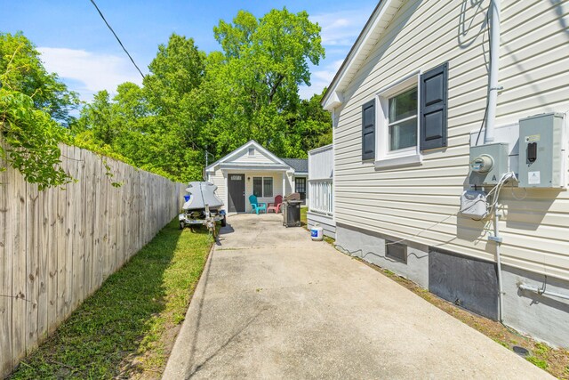 1324 Maxwell St, North Charleston, SC 29405 - view of property exterior with an outdoor structure, fence, and crawl space