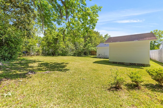 1324 Maxwell St, North Charleston, SC 29405 - view of yard featuring an outbuilding, a shed, and fence