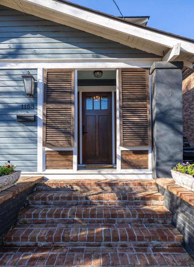 property entrance with a porch